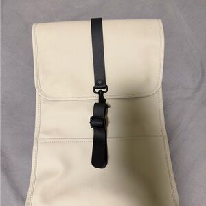 Rains Cream Roll-Top Backpack with Black Strap